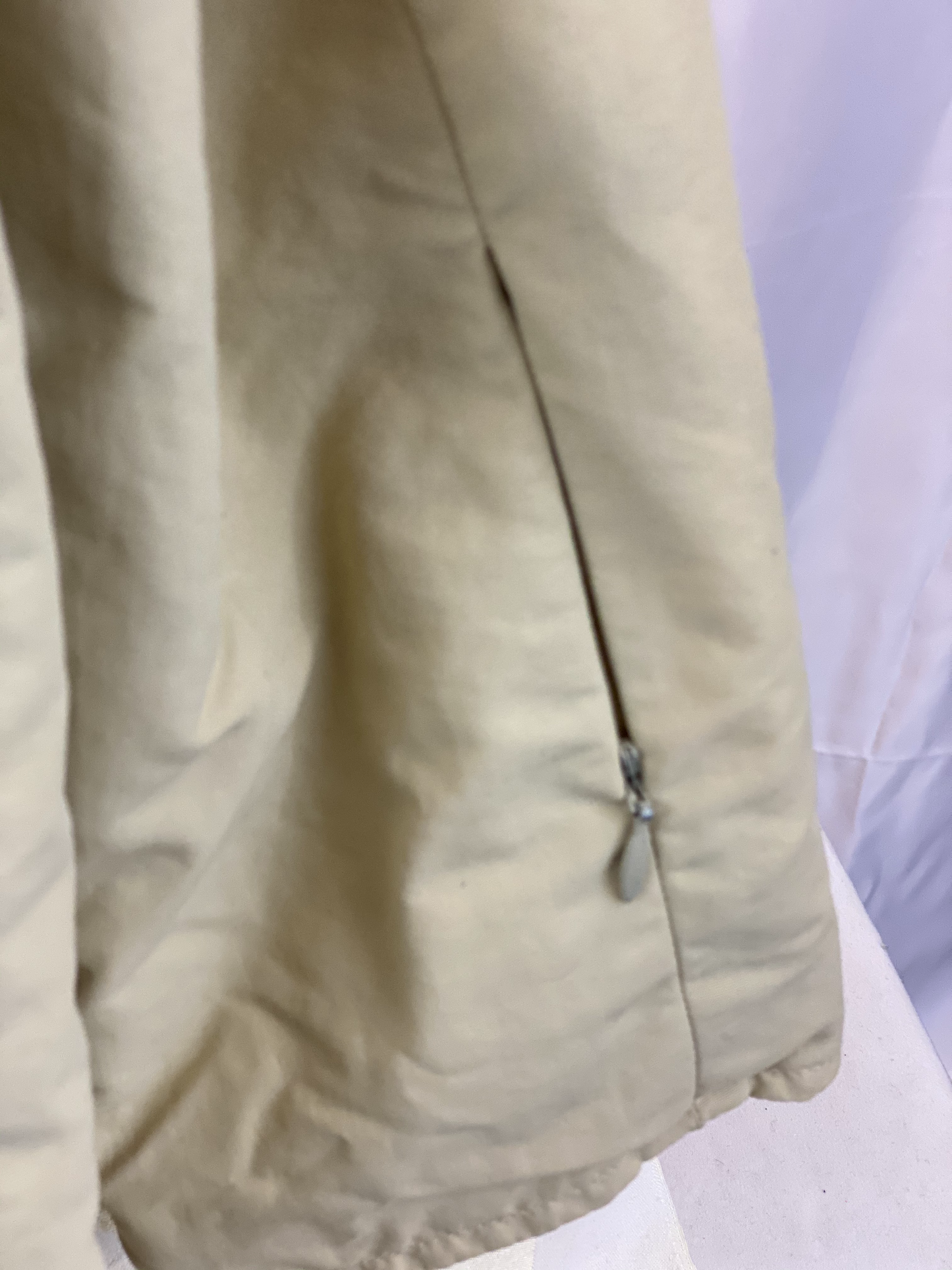 Pre-Owned - Excellent Condition Girl’s Size Small Coat Attached Hood Four (4) Zipper Pockets on Front Zipper Pocket on Each Sleeve 100% Polyester 24” Length; 23” Sleeve; 19” Across Chest Made in Thailand
