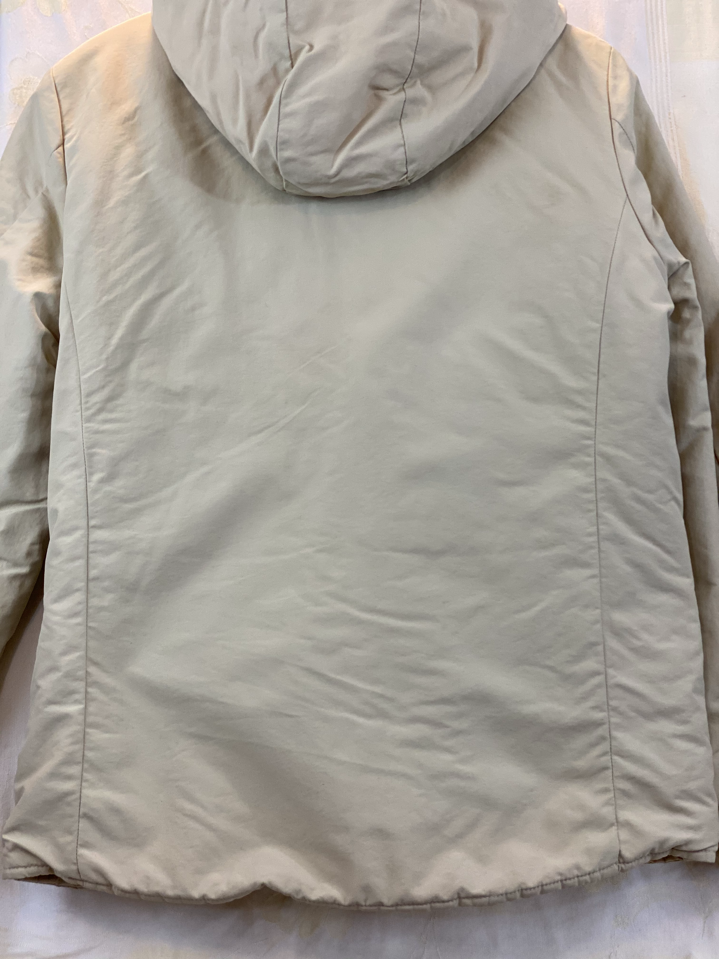 Pre-Owned - Excellent Condition Girl’s Size Small Coat Attached Hood Four (4) Zipper Pockets on Front Zipper Pocket on Each Sleeve 100% Polyester 24” Length; 23” Sleeve; 19” Across Chest Made in Thailand