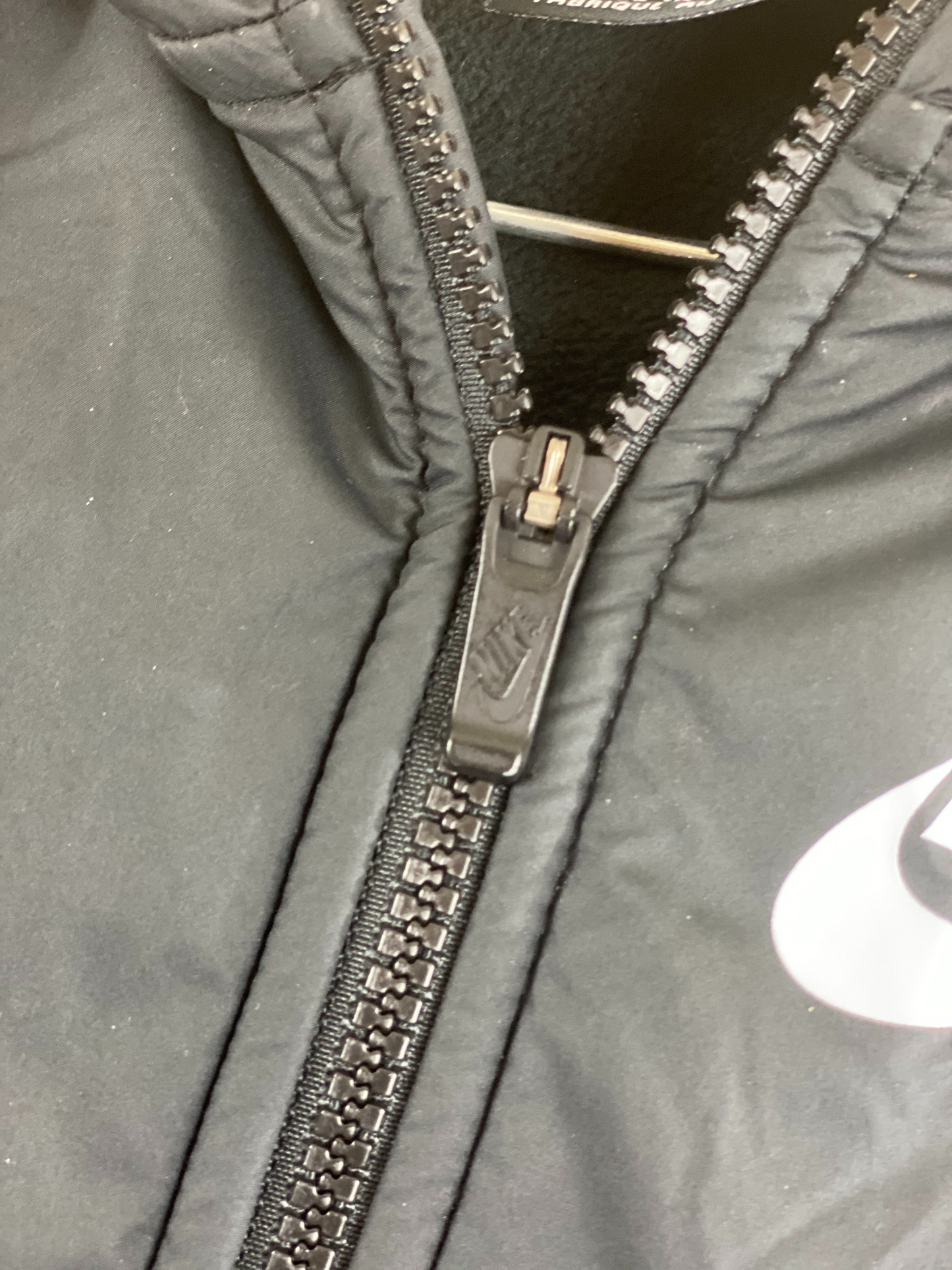 Nike Jacket with Attached Hood Fleece/Nylon Size Medium Zipper Front Closure Two (2) Front Pockets 20” Shoulder to Bottom; 20” Sleeve; 16” Across Chest