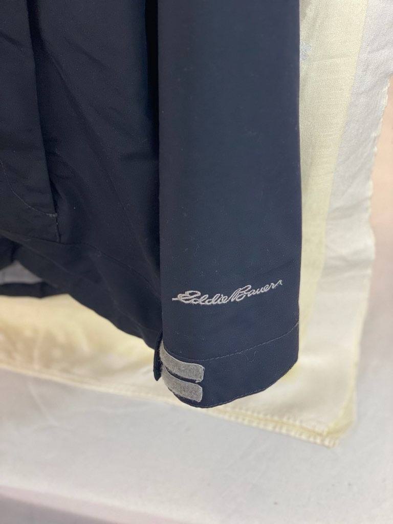 Grey 100% Polyester Coat Size is Small Removal of Hood and Lining Zipper and Snap Closure Two (2) Zipper Pockets on Side