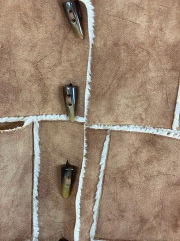 Tan Suede Girl’s Coat Size 8 Fleece Lined Fleece around Collar, Cuffs and Bottom Toggle Buttons for Closure Two (2) Large Front Pockets 24” Shoulder to Bottom 19” Sleeve Length 16” Across Chest