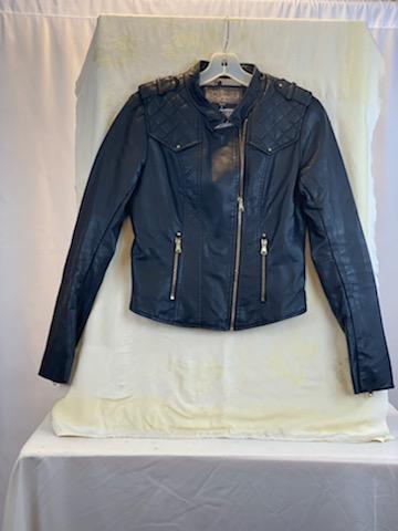 Leather-Like Black Jacket - Ci Sono by Cavalini Size Small Gold-Tone Zipper Front Closure Gold-Tone Zipper Two (2) Front Pockets Gold-Tone Zipper on Each Sleeve Gold-Tone Studs on Shoulders Quilted Trim on Shoulders and Back Skull Design on Lining 19” Shoulder to Bottom; .24” Sleeve; 17” Across Chest