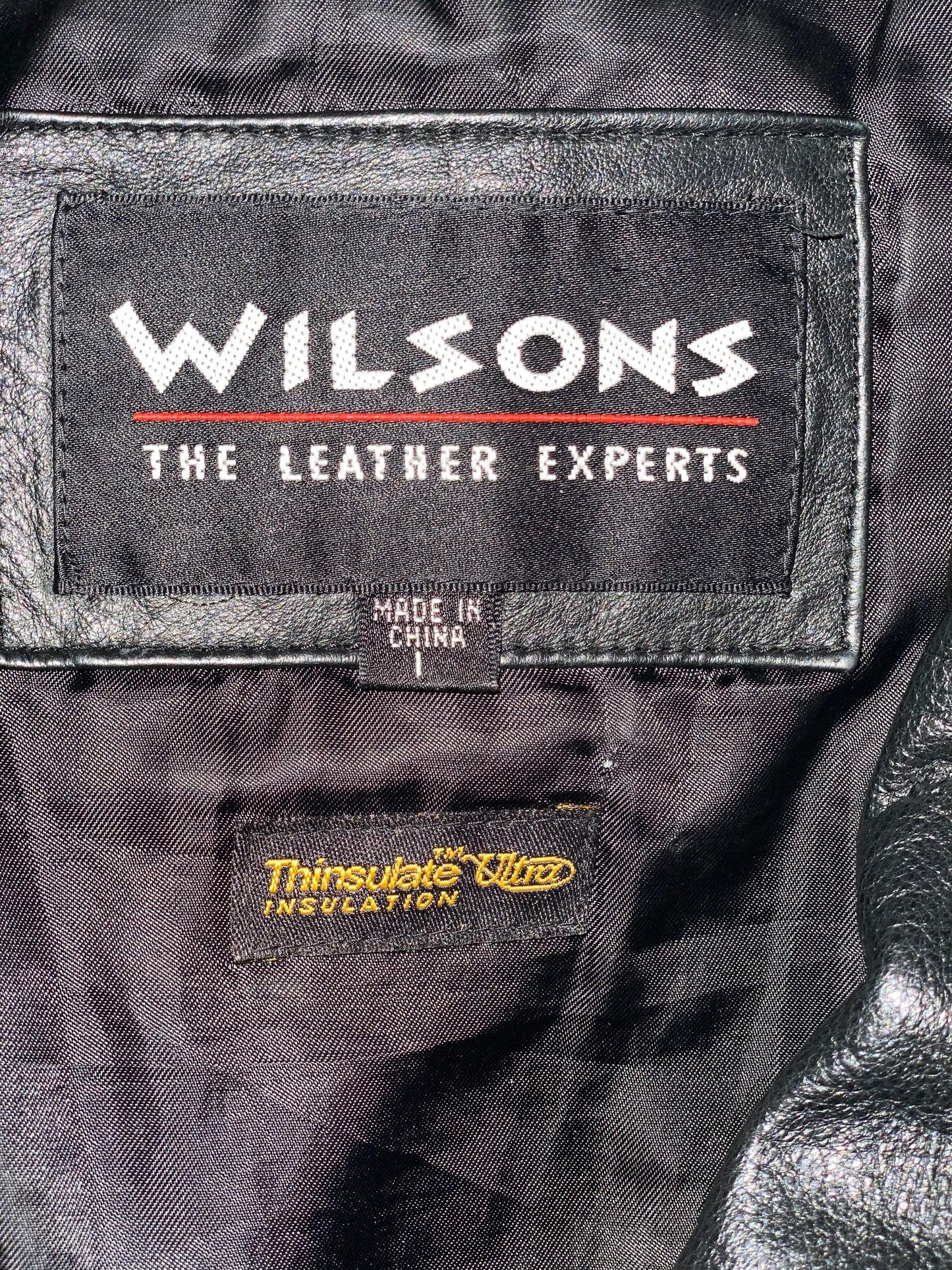 Pre-Owned - Excellent Condition Soft-Leather Coat Size Large Two (2) Button & Belt Front Closure Removable Lining Two (2) Front/Side Pockets 25” Shoulder to Bottom; 23” Sleeve; 22” Across Chest