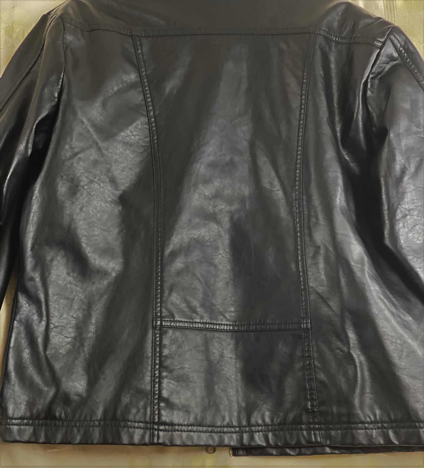 Pre-Owned - Excellent Condition Black - Soft Leather Medium Two (2) Front/side Pockets Zipper Front Closure 25” Shoulder to Bottom 24” Sleeve 18” Across Chest