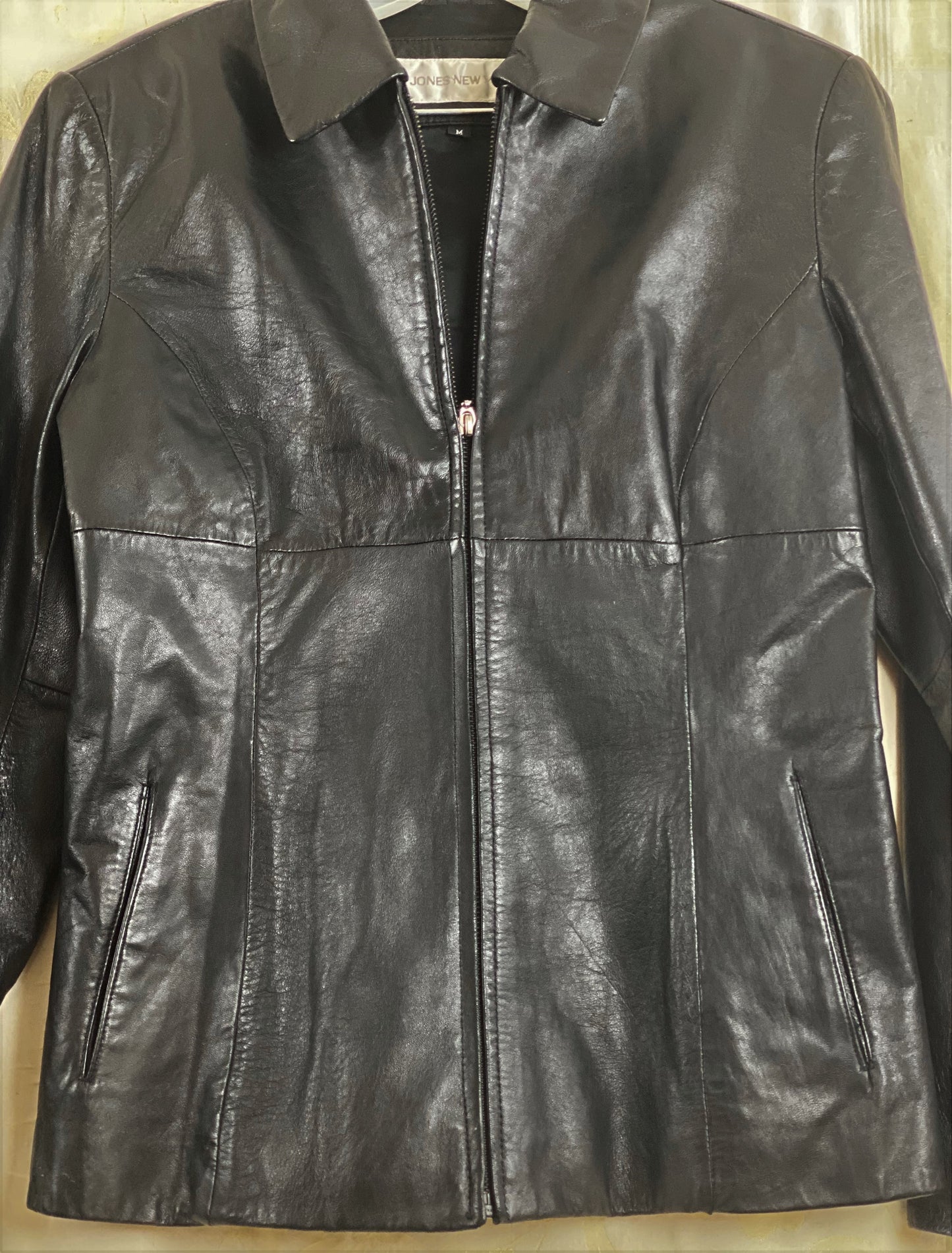Pre-Owned - Excellent Condition Black - Soft Leather Medium Two (2) Front/side Pockets Zipper Front Closure 25” Shoulder to Bottom 24” Sleeve 18” Across Chest