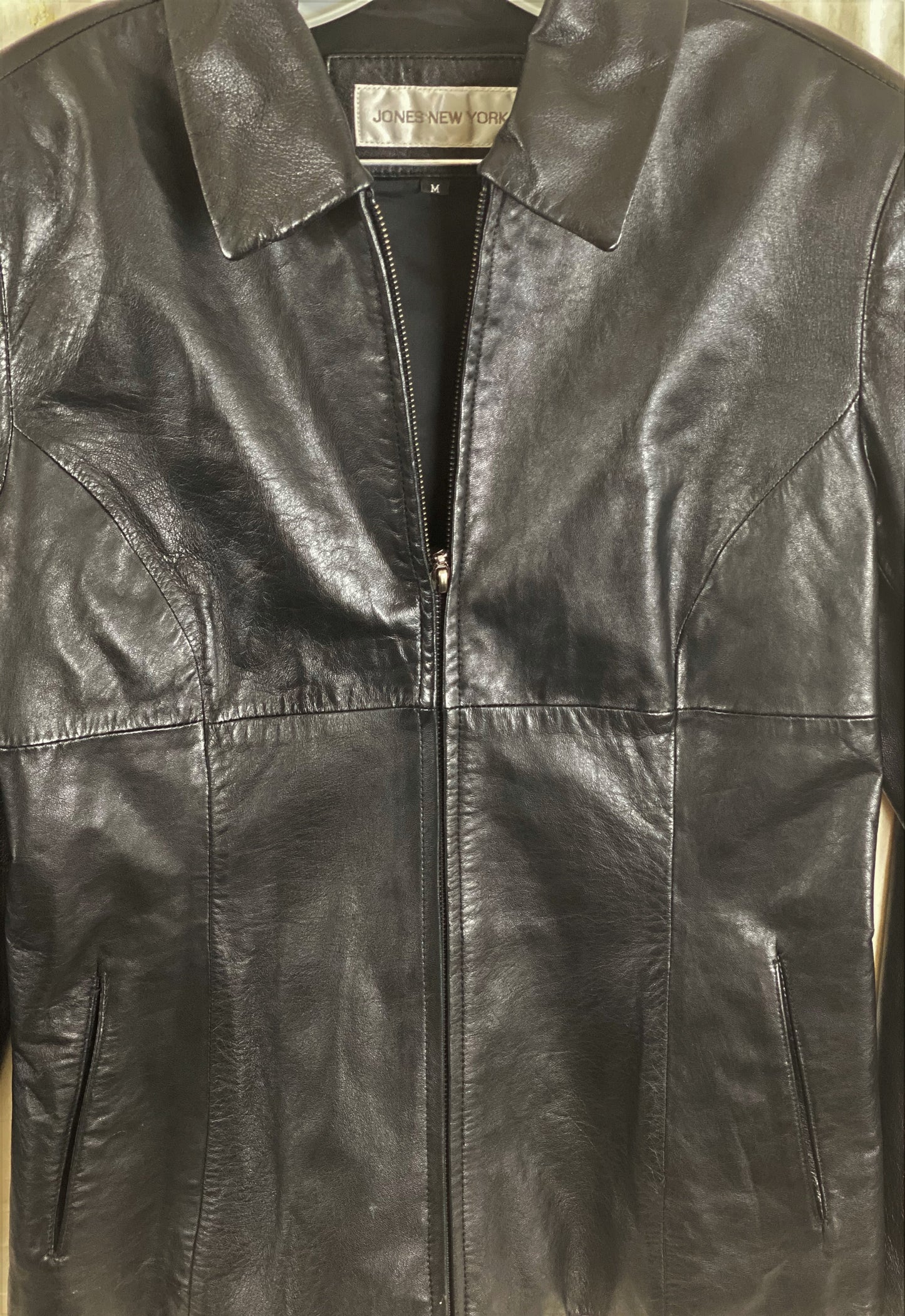 Pre-Owned - Excellent Condition Black - Soft Leather Medium Two (2) Front/side Pockets Zipper Front Closure 25” Shoulder to Bottom 24” Sleeve 18” Across Chest