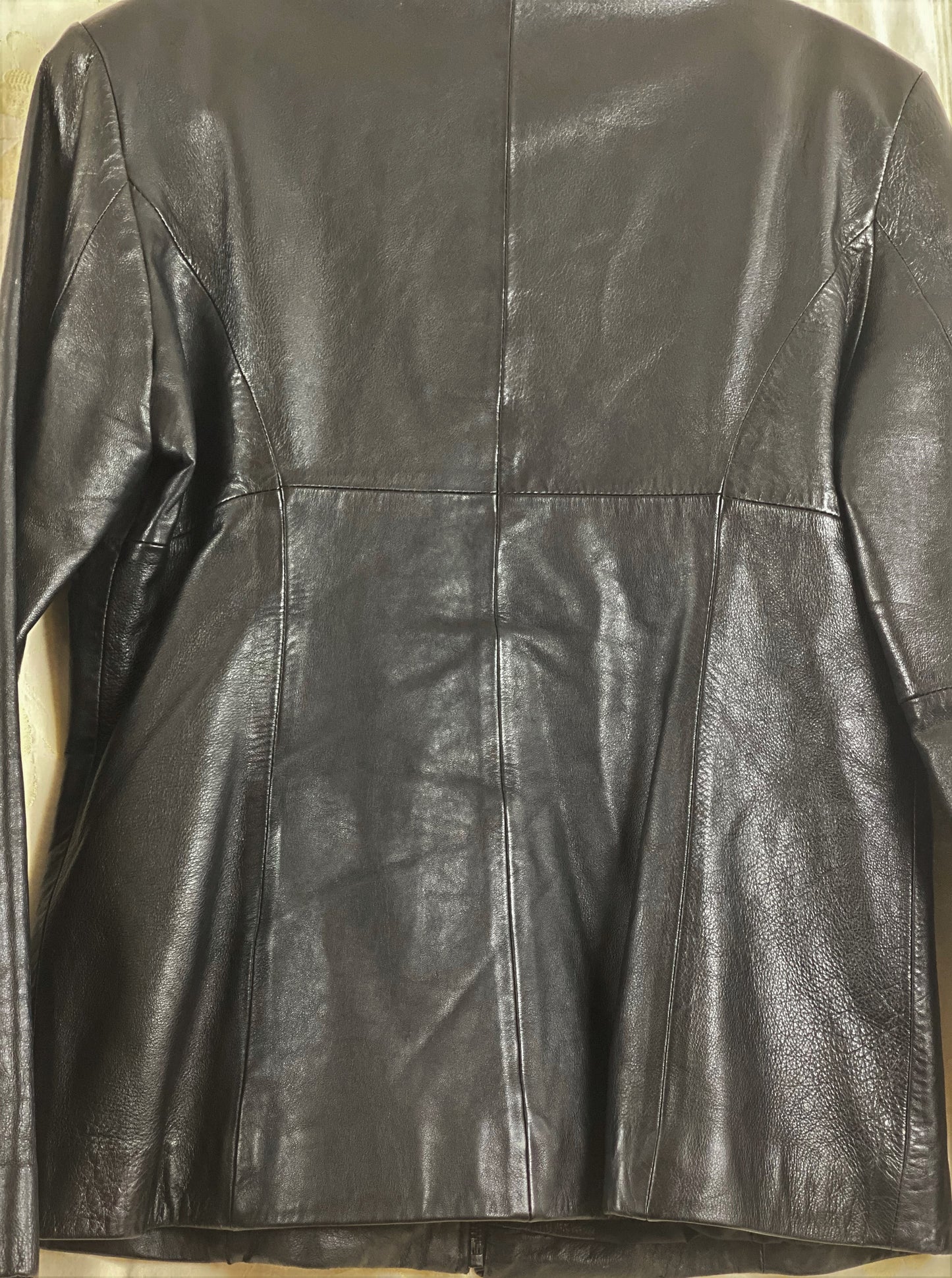 Pre-Owned - Excellent Condition Black - Soft Leather Medium Two (2) Front/side Pockets Zipper Front Closure 25” Shoulder to Bottom 24” Sleeve 18” Across Chest