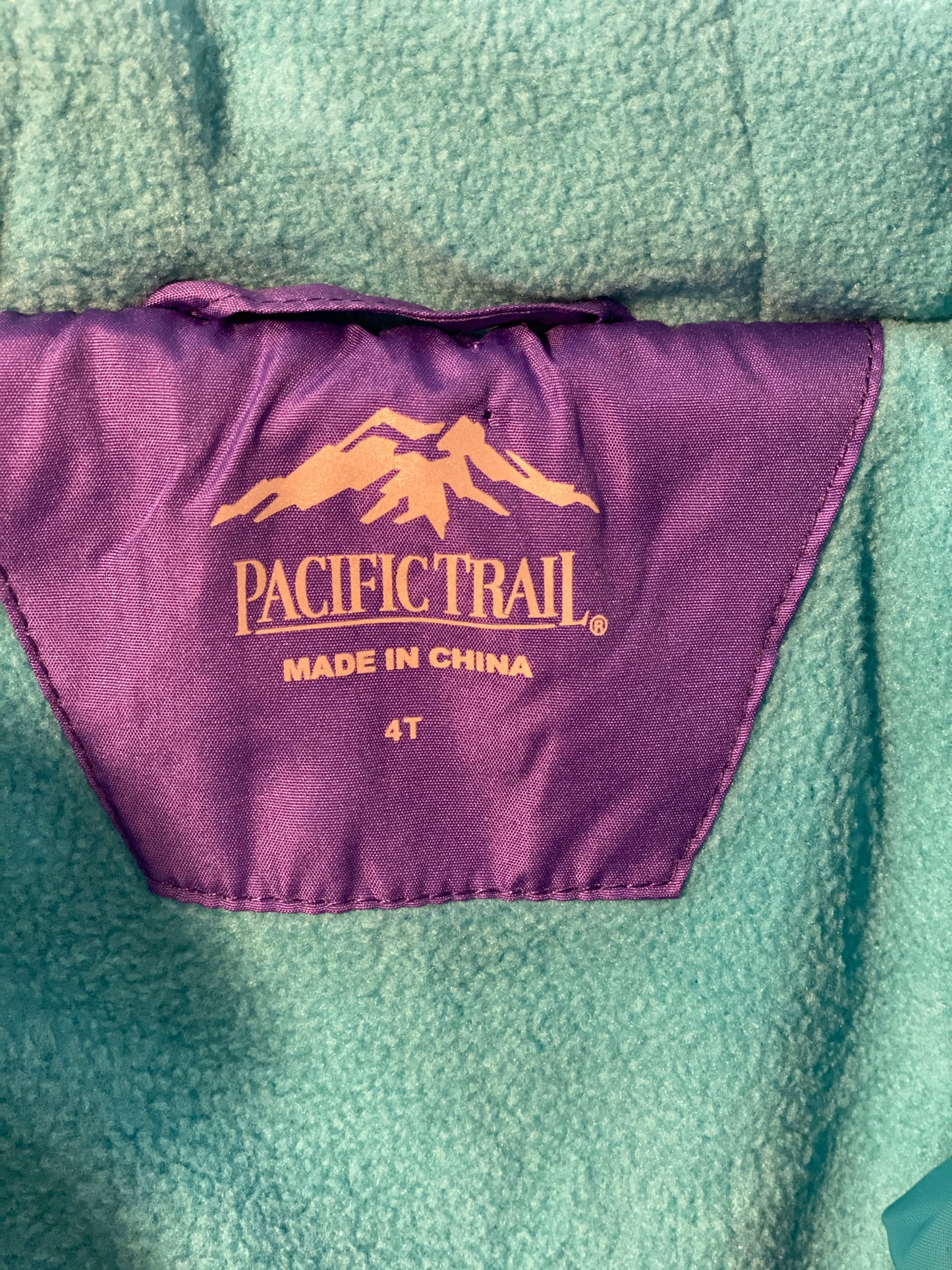 Pre-Owned - Excellent Condition Girl’s Coat - Size 4-T Purple & Aqua Color Attached Hood Two (2) Front Pockets 16” Shoulder to Bottom; 14” Sleeve; 13’ Across Chest 100% Polyester