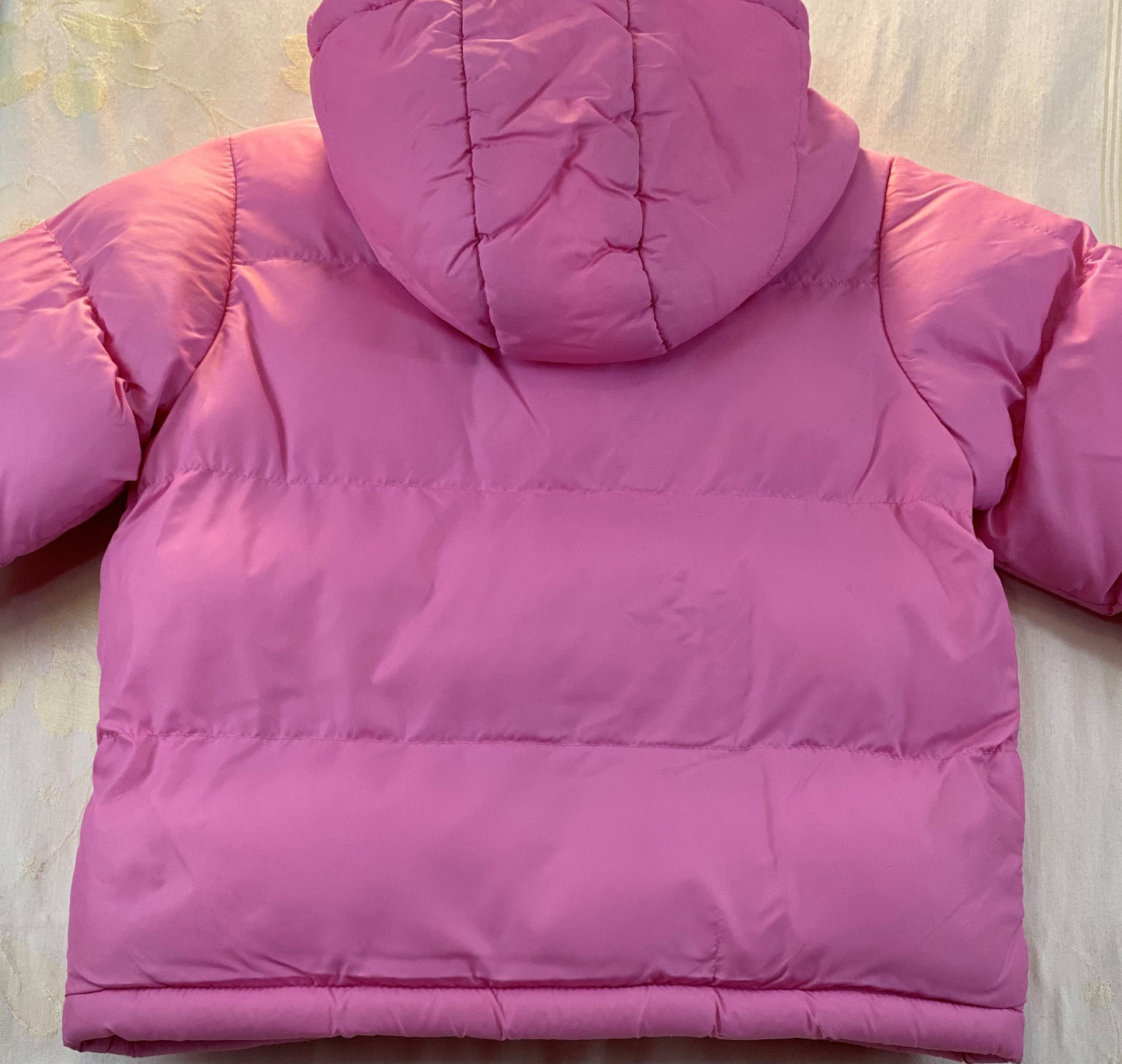 Pre-Owned - Excellent Condition Pink Coat With Attached Hood Two (2) Zipper Front Pockets Front Slot/Pocket for Mittens 15” Shoulder to Bottom 10” Sleeve 14” Across Chest