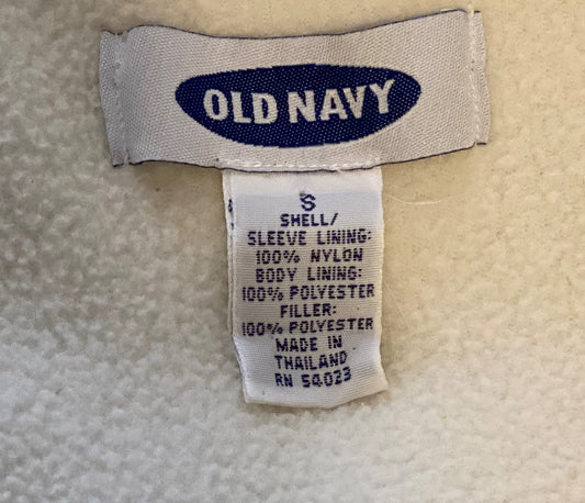 Pre-Owned - Excellent Condition Girl’s Size Small Coat Attached Hood Four (4) Zipper Pockets on Front Zipper Pocket on Each Sleeve 100% Polyester 24” Length; 23” Sleeve; 19” Across Chest Made in Thailand