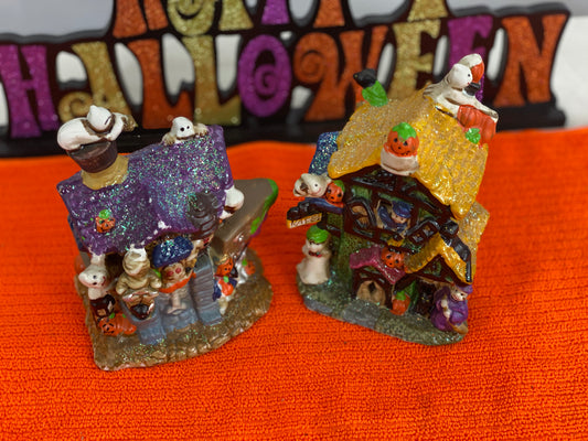 Set of Haunted Houses - Two (2) Ceramic With Sparkly Finish Many Decorations on Each House Each House is Approx. 5”H x 4” W Electric-Illumination
