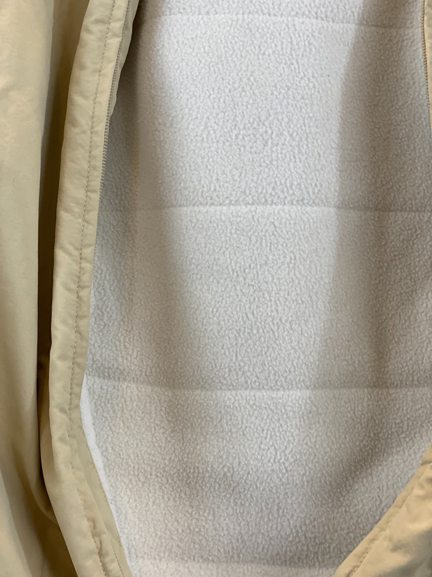 Pre-Owned - Excellent Condition Girl’s Size Small Coat Attached Hood Four (4) Zipper Pockets on Front Zipper Pocket on Each Sleeve 100% Polyester 24” Length; 23” Sleeve; 19” Across Chest Made in Thailand