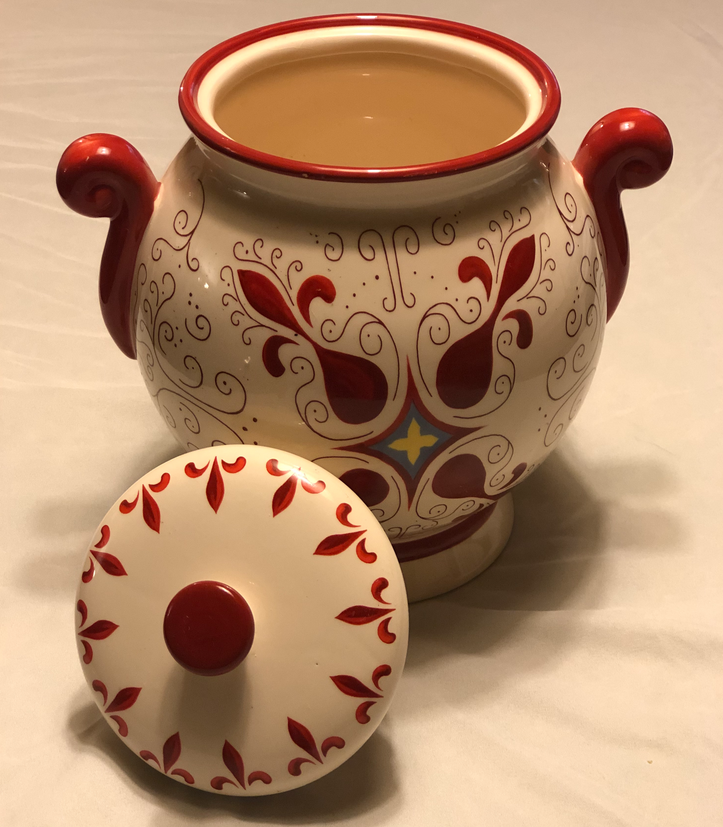 Decorative Red and White Colors Approximately 9” High Fleur de Lis Design Two (2) Side Handles Round Shape with Lid