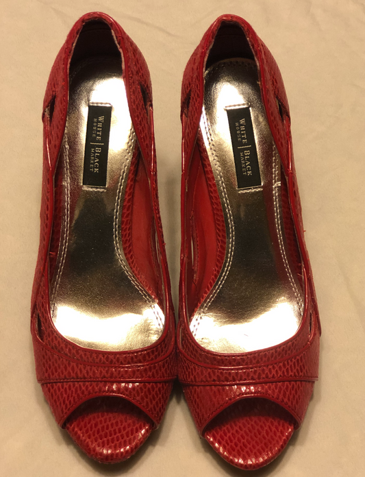 White House/Black Market Red Heels  Cut-Out Design on Sides  Leather Soles  - Slight Wear on Soles  Approx 4” Heels  Open Toe 