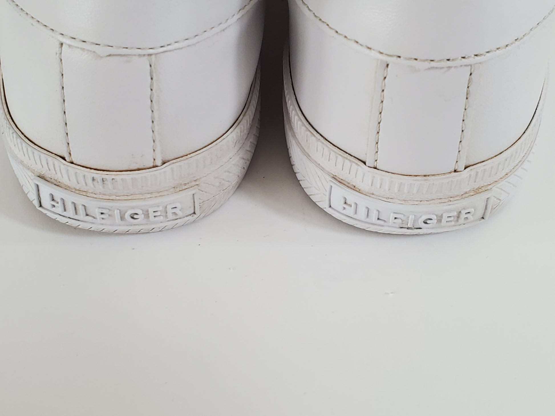 White with Red/White/Blue Stripe Accents  TH Initials on Side of Sneaker  Low Top - Lace up  Very Clean Pre-Owned Sneakers