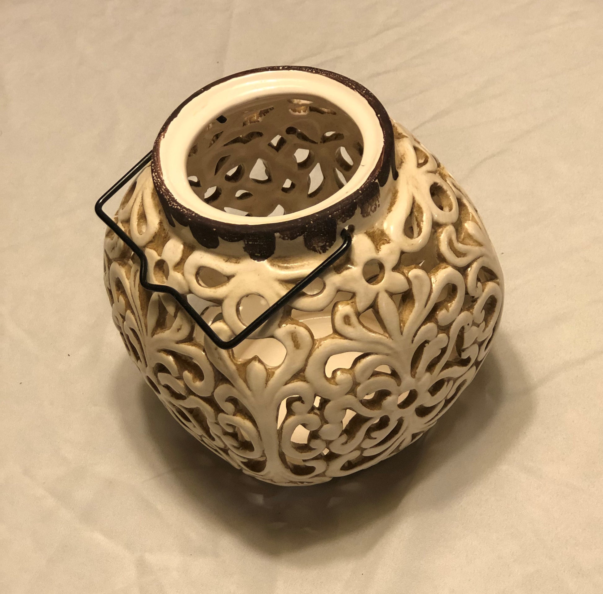 Ceramic Candle Holder with Wire Handle  Swirl/Intricate Design  Cream Color  Approx:  6.5” H x 5” W