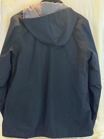 Grey 100% Polyester Coat  Size is Small  Removal of  Hood and Lining  Zipper and Snap Closure  Two (2) Zipper  Pockets on Side