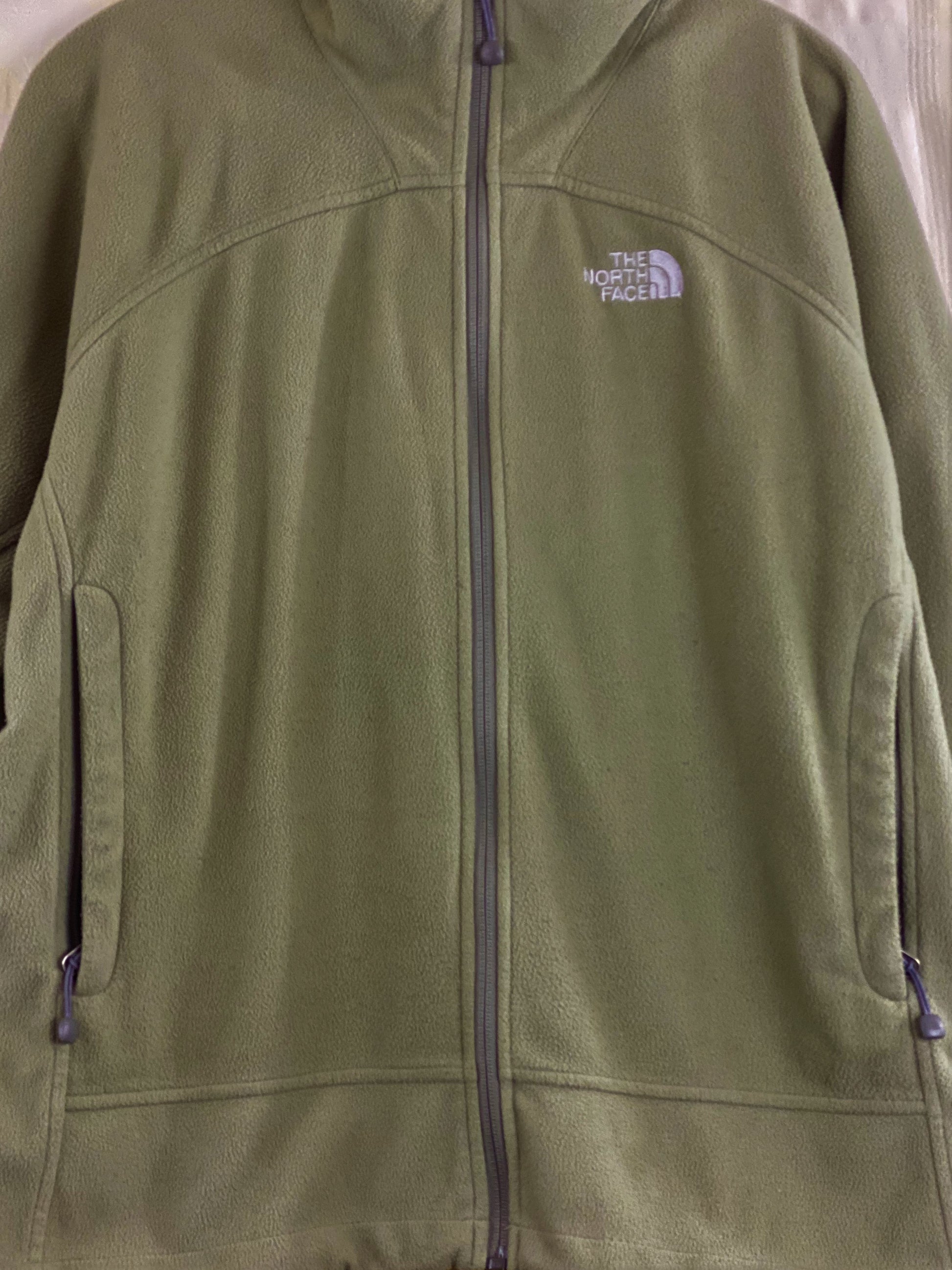 Pre-Owned - Excellent Condition   Medium-Green Windwall Fleece Jacket   Size XL  Windproof and Wind Resistant  Two (2) Front Zipper Pockets  24” Shoulder to Bottom; 28” Sleeve;  23’ Across Chest