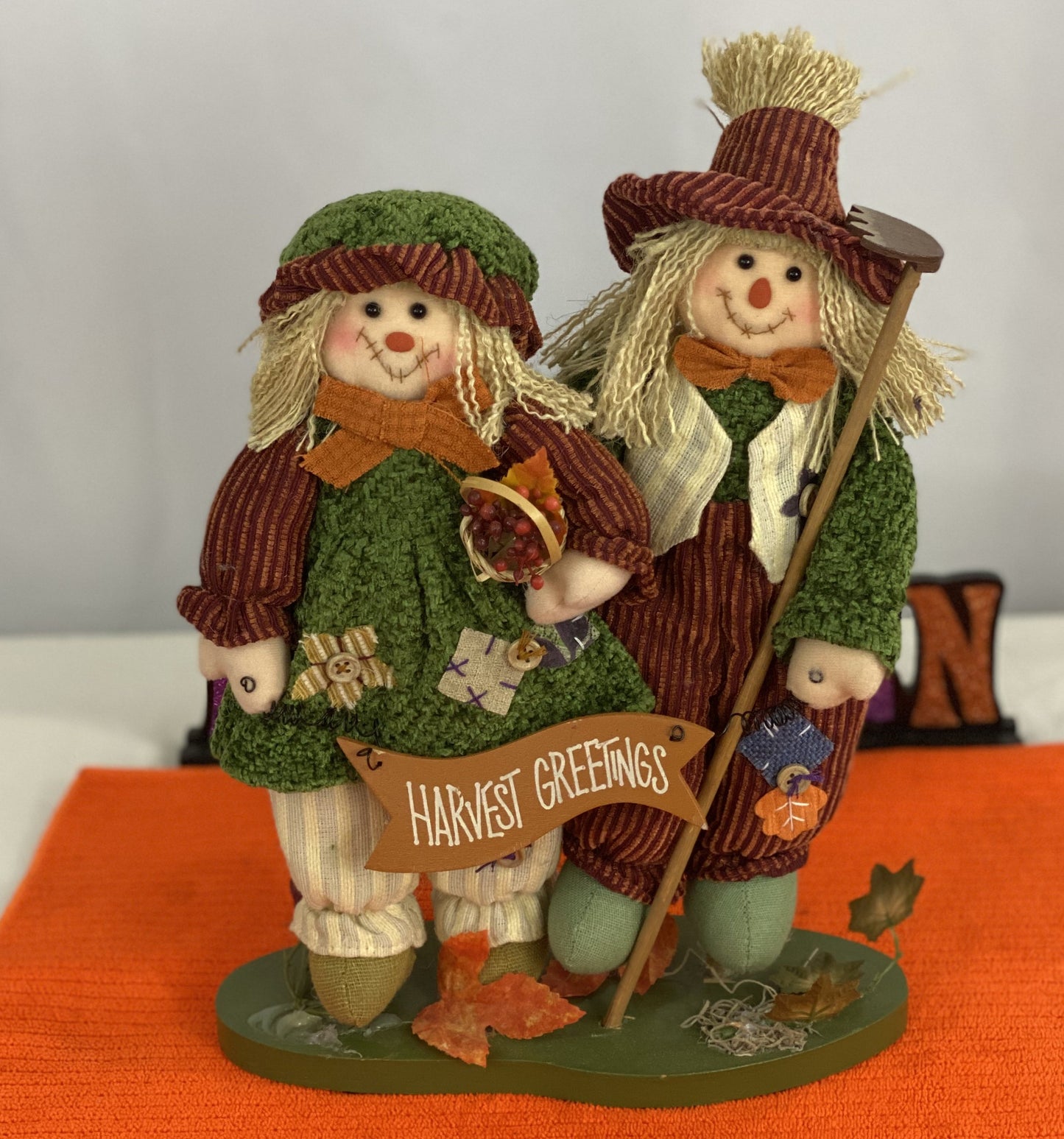 Approx. 9.5 W x 13.5 H  Clothing is made of cloth/corduroy fabric  Decorated with seasonal images and “Harvest Greetings” sign