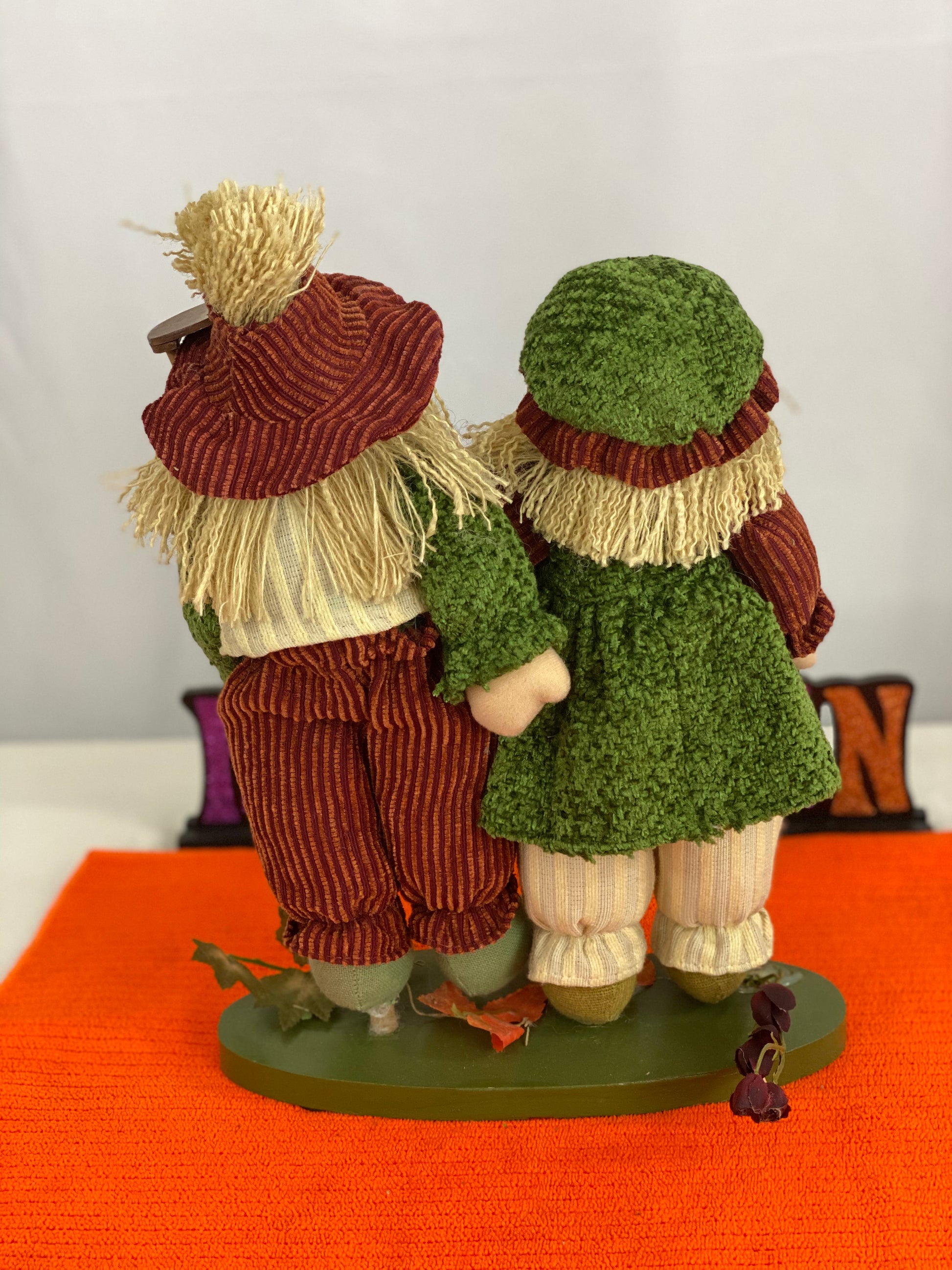 Approx. 9.5 W x 13.5 H  Clothing is made of cloth/corduroy fabric  Decorated with seasonal images and “Harvest Greetings” sign