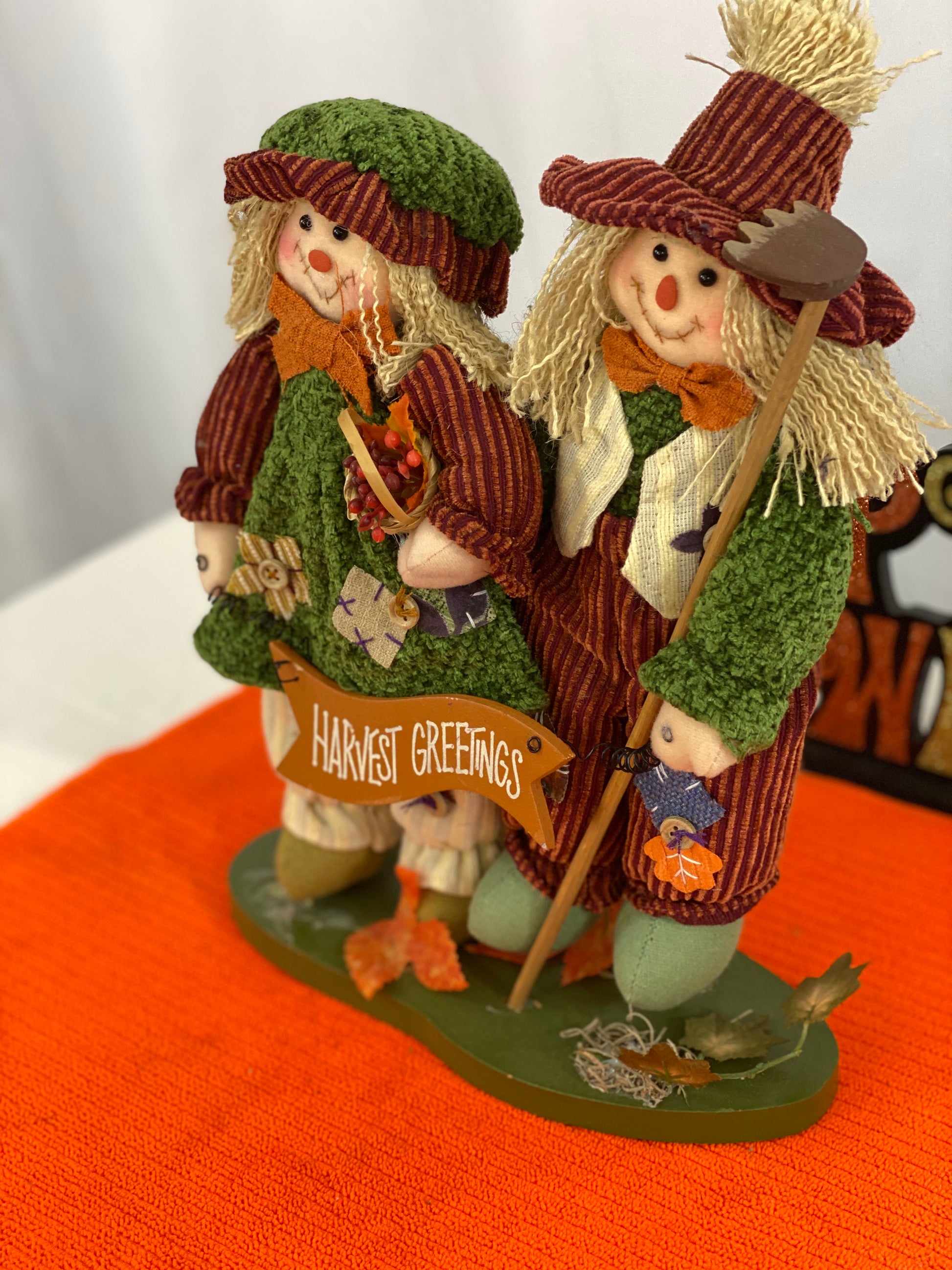 Approx. 9.5 W x 13.5 H  Clothing is made of cloth/corduroy fabric  Decorated with seasonal images and “Harvest Greetings” sign