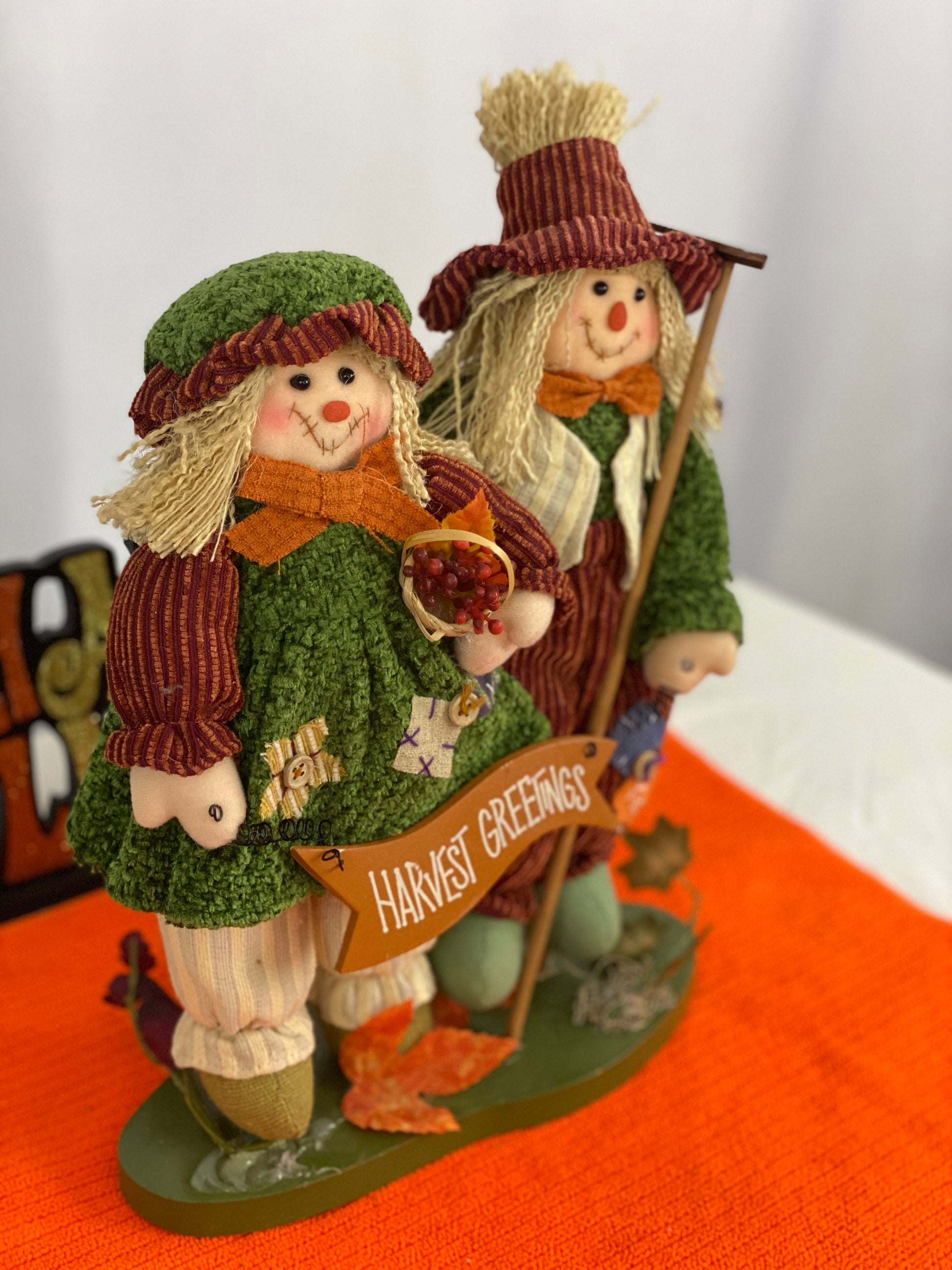 Approx. 9.5 W x 13.5 H  Clothing is made of cloth/corduroy fabric  Decorated with seasonal images and “Harvest Greetings” sign