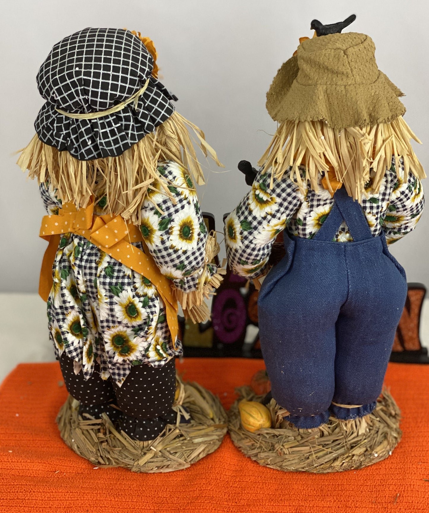 Set of Fabric Mache Scarecrows  Made of Fabric, Straw   Intricate Ceramic Accessories  Approx 14” H on Stands  Ideal for Table-Top Decor  In Original Box