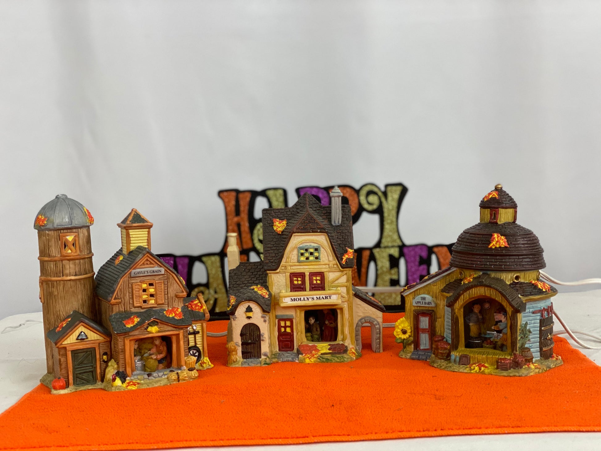 Gayle’s Grain Approx 6.5” H x 5” W x 3” D  Molly’s Mart  Approx  6.5” H x 5.75” W x 3.5” D  The Apple Barn Approx 6” H x 5” W x 4” D    Ceramic Pieces  Electric Lighting/Illumination  Great Detail of Autumn Decor