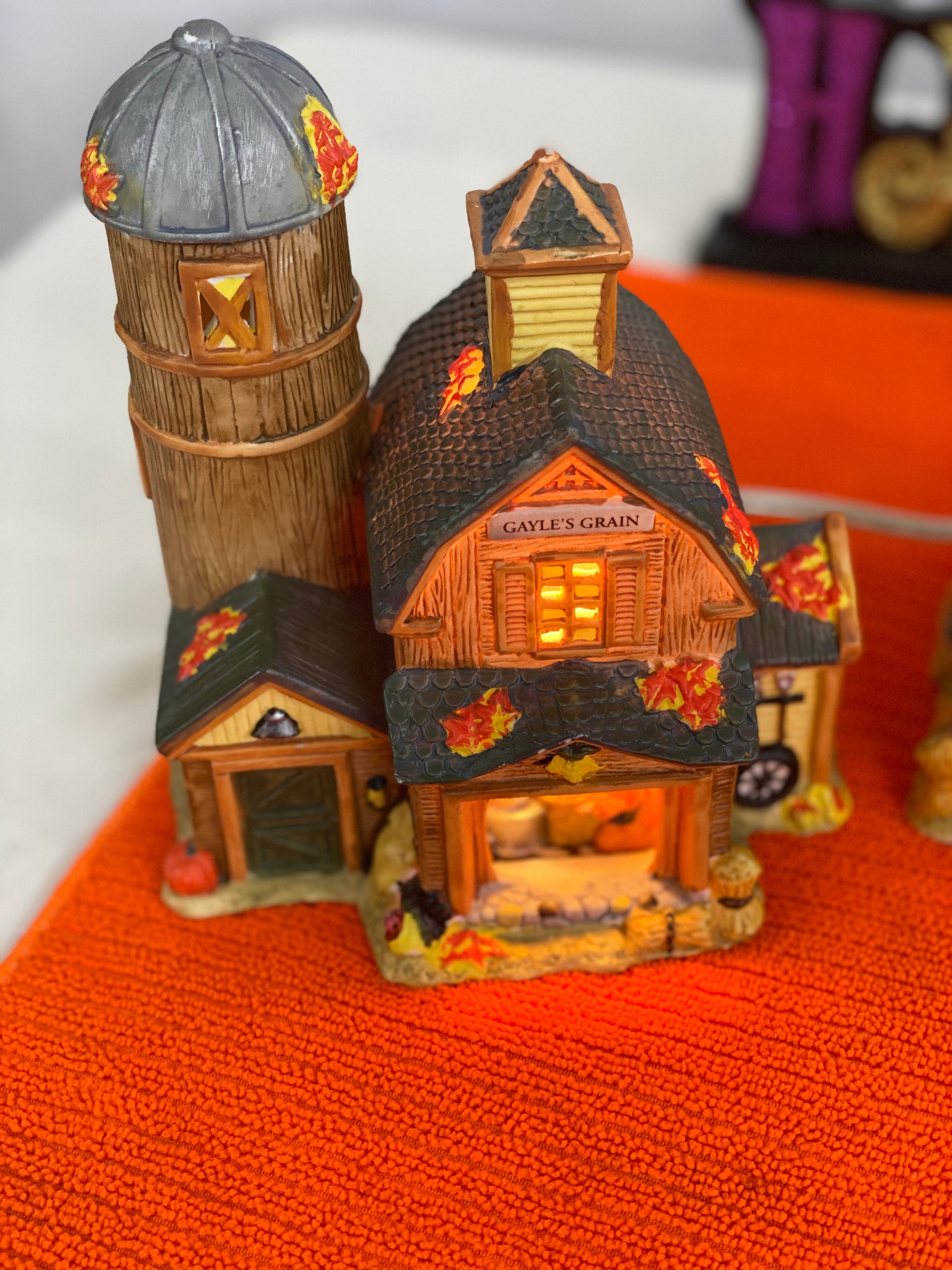 Gayle’s Grain Approx 6.5” H x 5” W x 3” D  Molly’s Mart  Approx  6.5” H x 5.75” W x 3.5” D  The Apple Barn Approx 6” H x 5” W x 4” D    Ceramic Pieces  Electric Lighting/Illumination  Great Detail of Autumn Decor