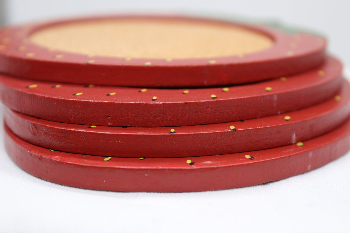 Set of four (4) Wooden Coasters 			Cork Inlay 			Strawberry Design 			Holder -  Wooden Shaped/Designed                Basket With Strawberries 	                                  Approx:    4.5”W x 5”H