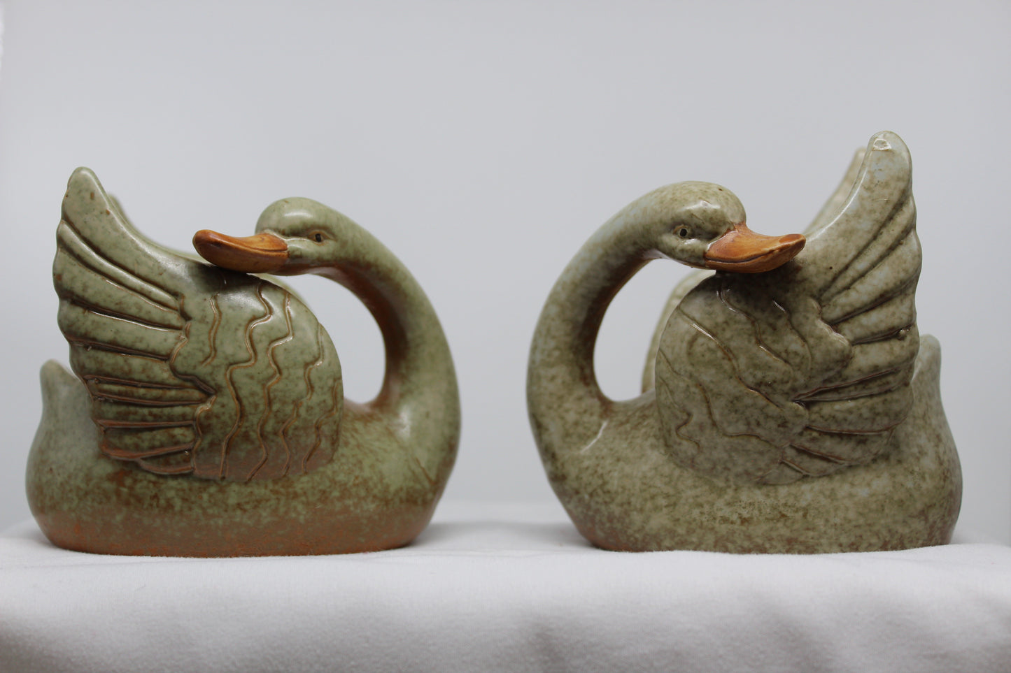 Set of two (2) Stone Swans  Votive Candle Holders  Green with Brown Beaks  Each Measures Approx:    4.5” W x 3.5” H