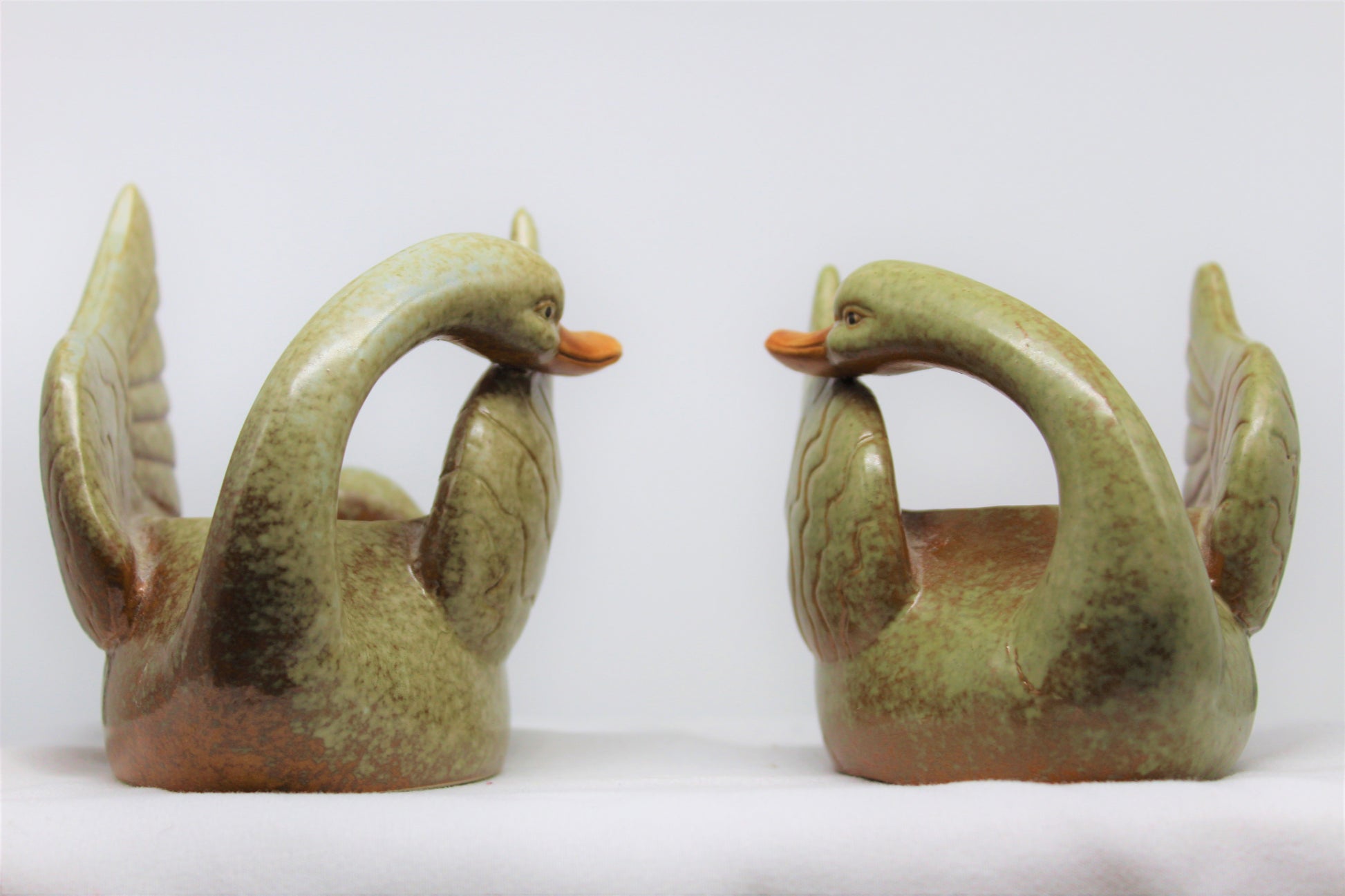 Set of two (2) Stone Swans  Votive Candle Holders  Green with Brown Beaks  Each Measures Approx:    4.5” W x 3.5” H