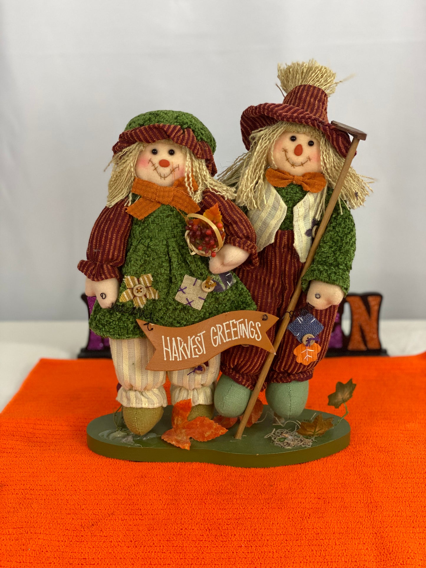 Approx. 9.5 W x 13.5 H  Clothing is made of cloth/corduroy fabric  Decorated with seasonal images and “Harvest Greetings” sign